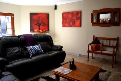 Two bedroom self catering unit lounge with big screen & DStv